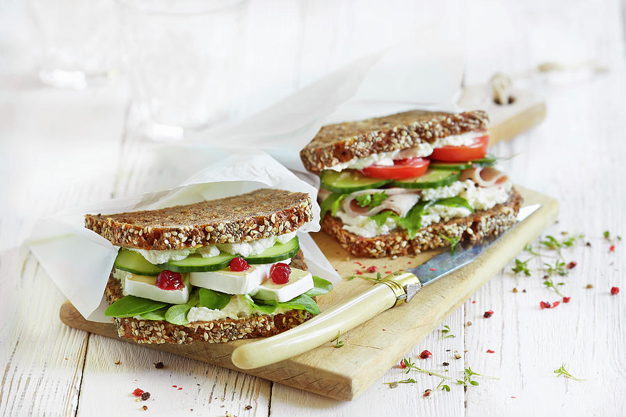 Wholemeal Sandwiches With Cheese And Turkey Breast Photograph by Sven C. Raben