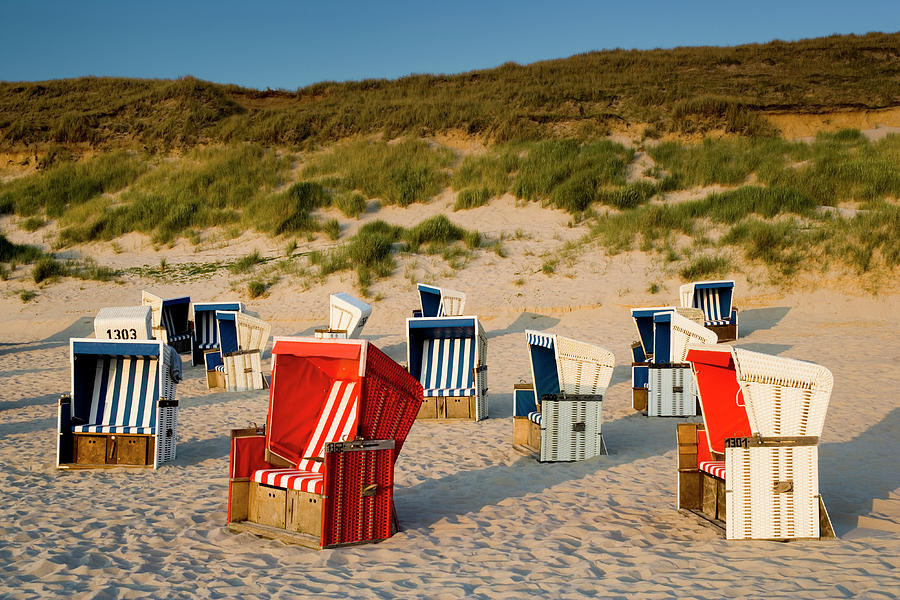 Sunset Photograph - Wicker Beach Chairs On Beach by Jorg Greuel