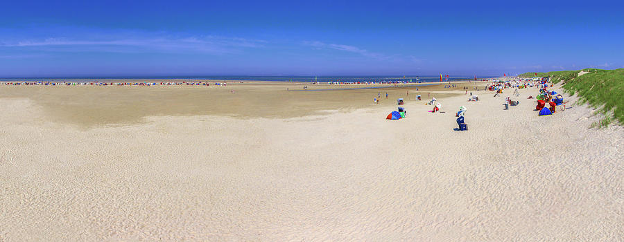 Wide beach in Amrum Photograph by Sun Travels