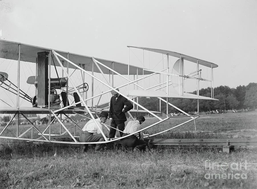 Wilbur And Orville Wright And Charlie Taylor Put A Plane On The Launch Rail For The First Army Flight At Fort Myer, Virginia, In July 1909 (b/w Photo) Photograph by Harris & Ewing