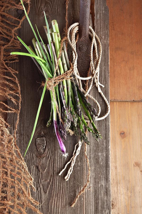 Wild Asparagus And Onions Photograph by Atelier Hmmerle