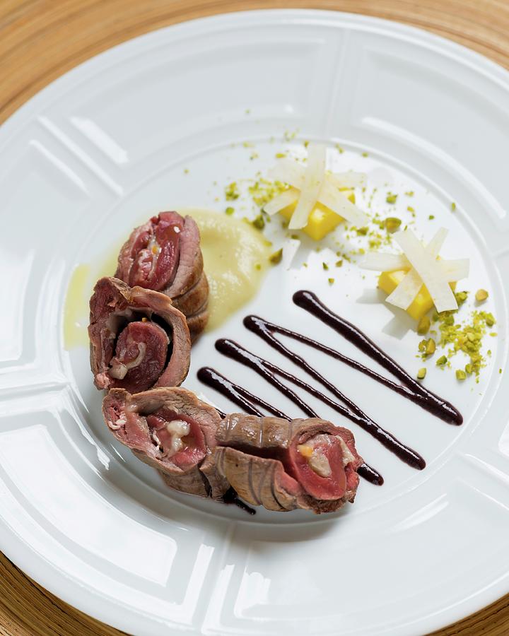 Wild Boar Roulade With Fennel, Orange Jelly And Olive Sauce restaurant Da Caino, Head Chef Valeria Piccini Photograph by Anthony Lanneretonne