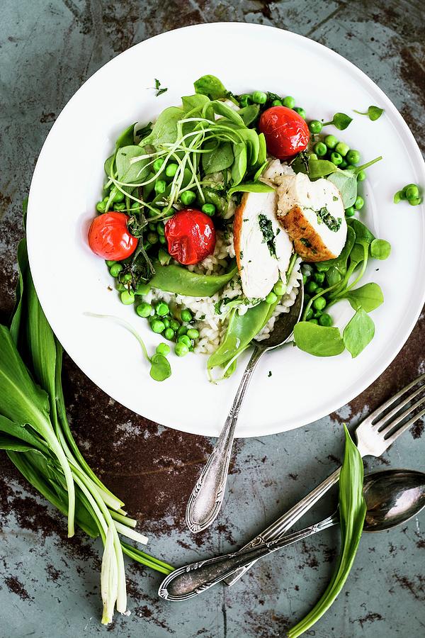 Wild Garlic Risotto With Stuffed Chicken Breast And Peas Photograph by Simone Neufing