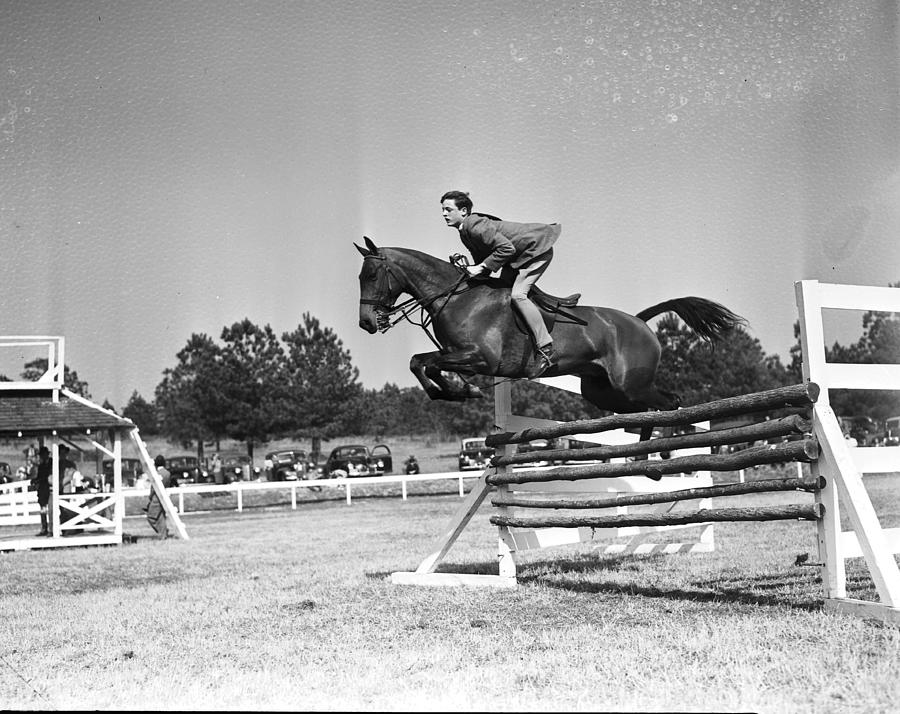 William F Buckley Jr Show Jumping His Photograph by Bert Morgan