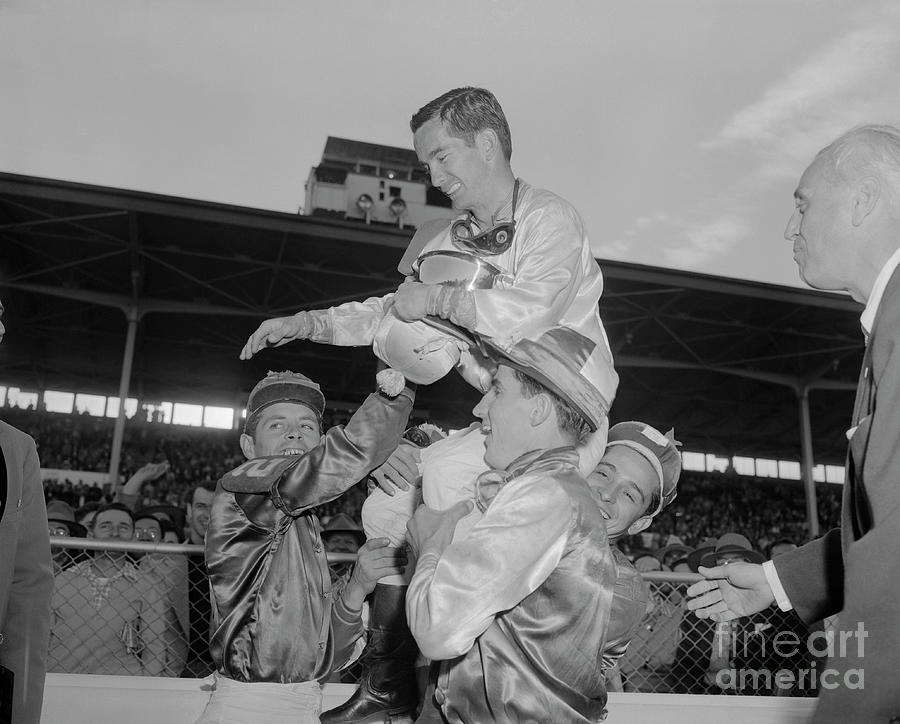 Willie Shoemaker Being Carried Photograph by Bettmann