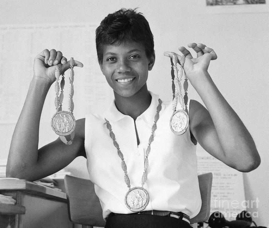 Wilma Rudolph Holding Her Gold Medals Photograph by Bettmann