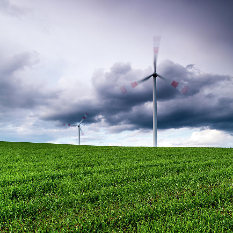 Wind Turbines On A Green Meadow Photograph by Mf-guddyx
