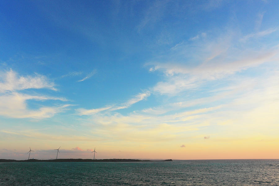 Wind Turbines On A Small Island Photograph by Imagewerks