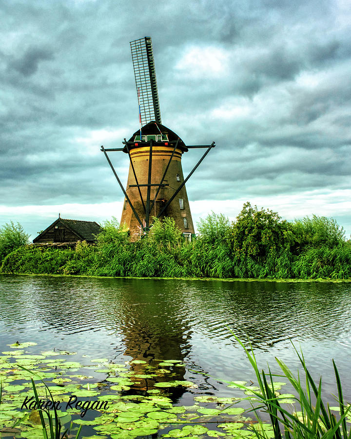Windmill of Kinderdijk Photograph by Karen Regan