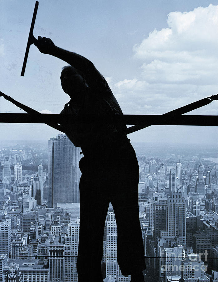 Window Washer Cleaning Skyscraper by Bettmann
