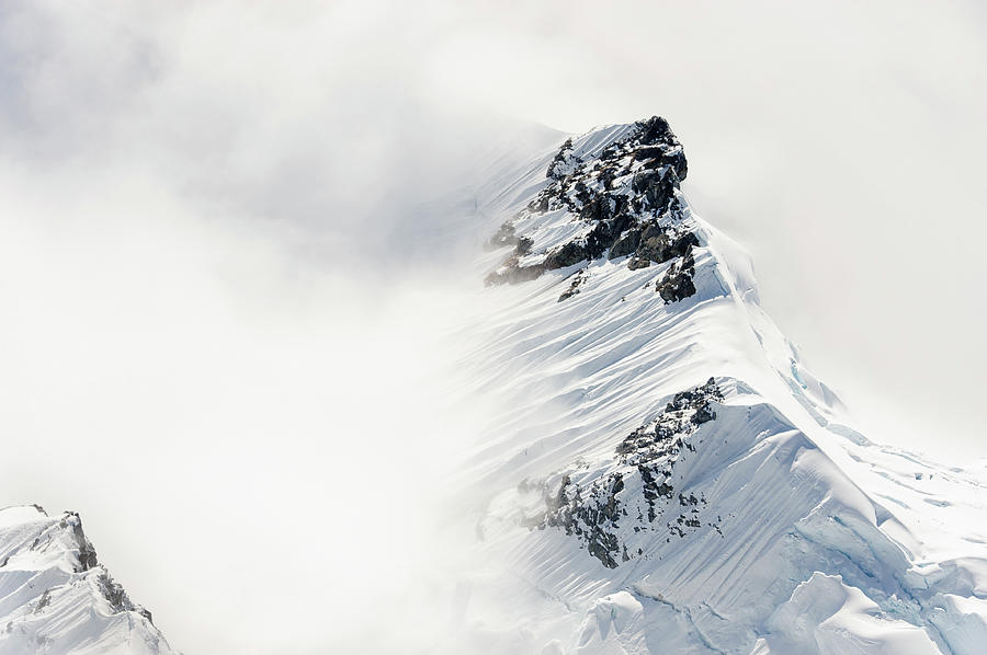 Windswept Mountain Peaks Photograph by Earleliason