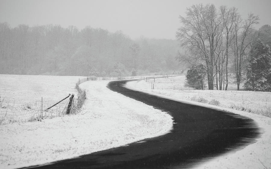 Windy Road Passing Through the Snowy Fields Photograph by Stamp City