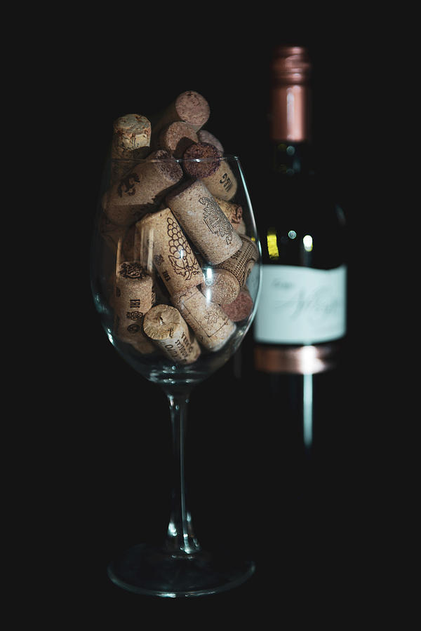 Wine Photograph - Wine Corks In The Wine Glass. Isolated Background by Alexandr Marynkin