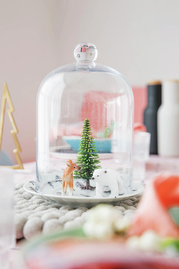 Winter Landscape With Animal Figurines Under Glass Cover Photograph by Ilaria Chiaratti