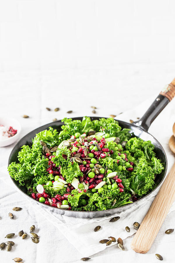 Winter Salad With Green Kale, Pomegranate Seeds, Peas, Mozzarella And Pumpkin Seeds Photograph by Theveggiekitchen
