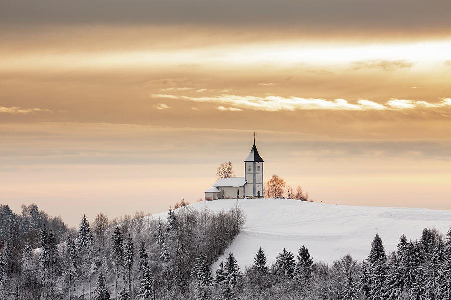 Winter sunrise at Jamnik church of Saints Primus and Felician Photograph by Ian Middleton