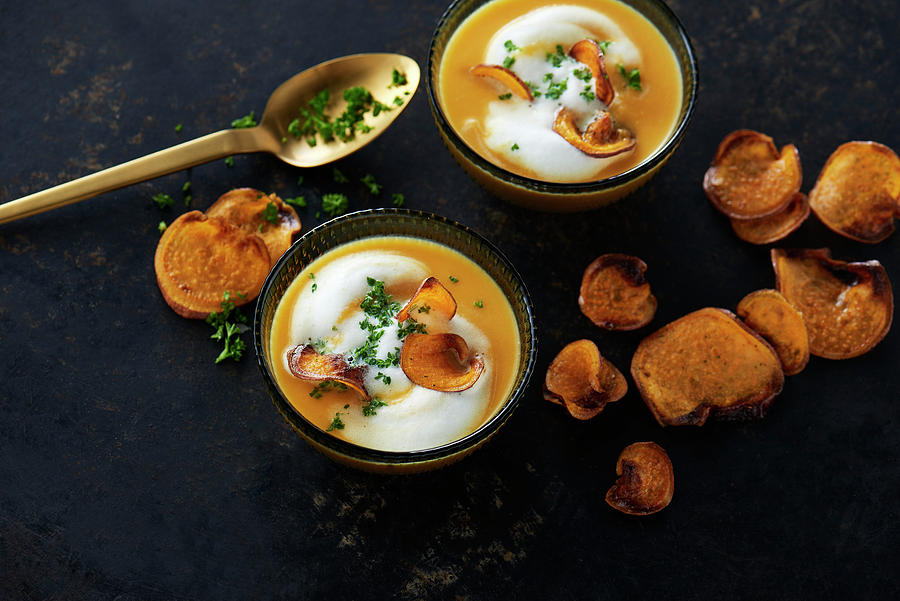Wintry Sweet Potato Soup With Milk Foam And Parsley Photograph by Stefan Schulte-ladbeck