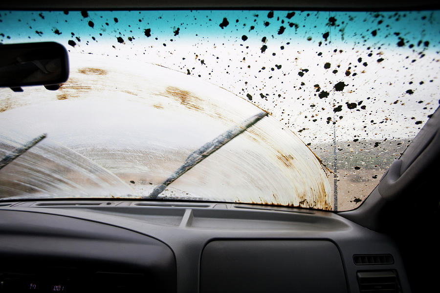 Transportation Photograph - Wiper Moving On Dirty Windshield Seen Through Car by Cavan Images