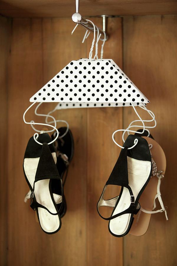 Wire Coat Hangers Decorated With Black And White Polka-dot Paper Used To Hang Up Ladys Sandals Photograph by Great Stock!