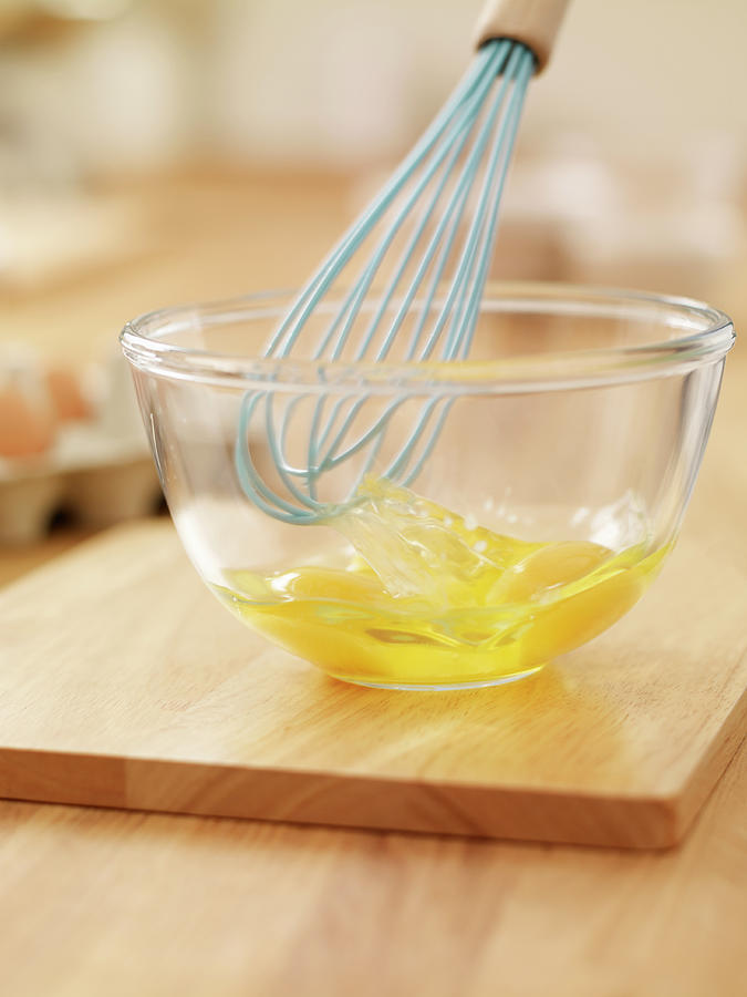 Wire Whisk Beating Eggs In Bowl On Photograph by Adam Gault