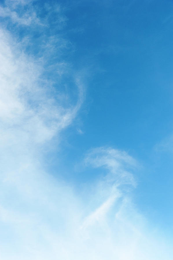 Wispy Clouds In Blue Sky Photograph by Stuart Mccall