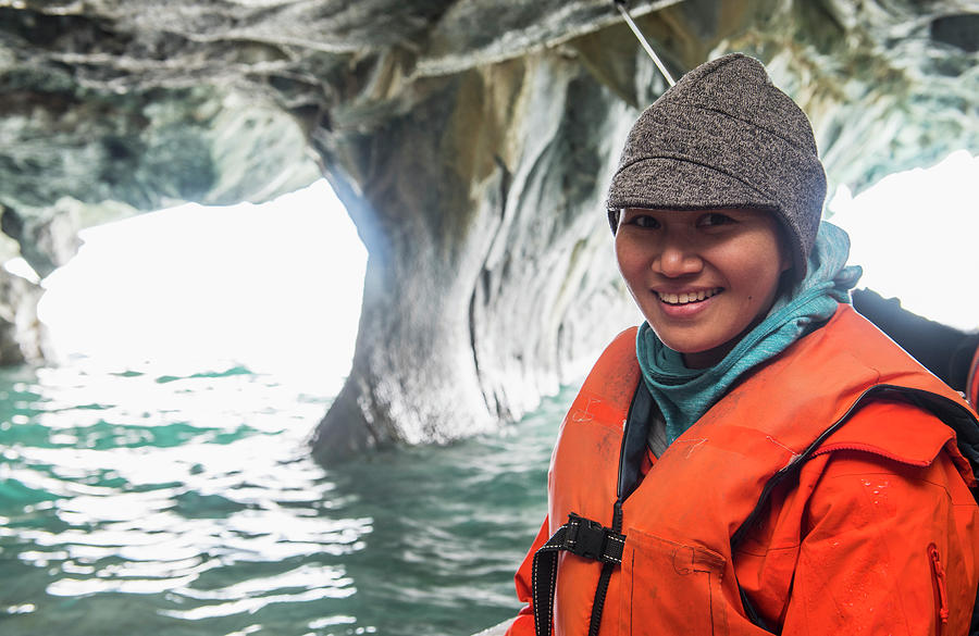 Chile Photograph - Woman Admiring The Marble Caves, Catedral De Marmol, Chile by Cavan Images Chile Photograph - Woman Admiring The Marble Caves, Catedral De Marmol, Chile by Cavan Images
