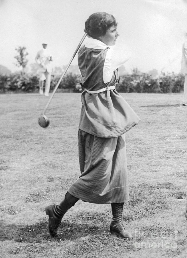Woman At End Of Golf Swing Photograph by Bettmann