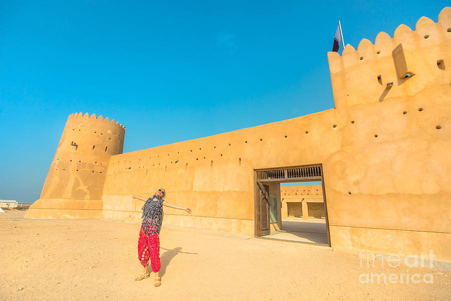 Woman at Zubara Fort Qatar Photograph by Benny Marty