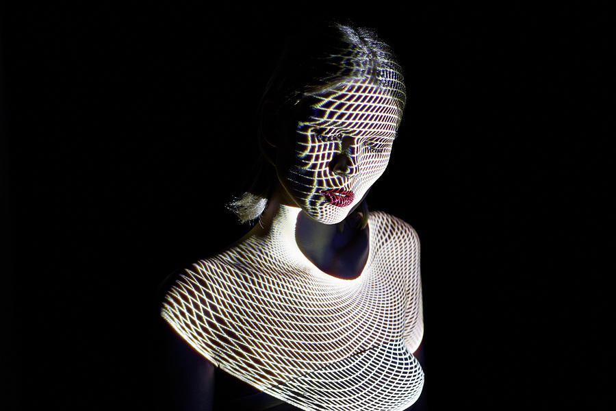 Woman Covered By Futuristic Patterns Of Photograph by Mads Perch