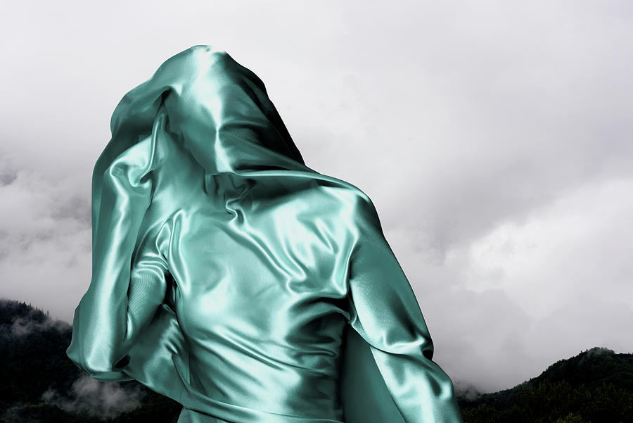 Woman Covered In Green Material With Sky Photograph by Tara Moore