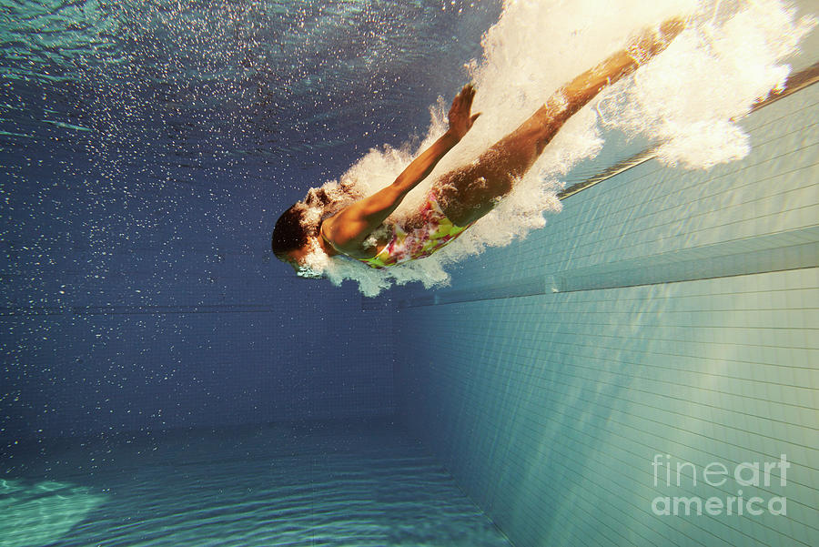 Woman Diving Underwater Photograph by Tara Moore
