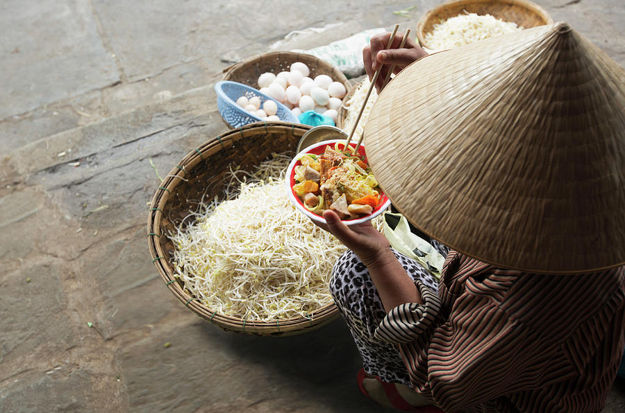 Woman Eating Noodles With Baskets Of Photograph by Eternity In An Instant