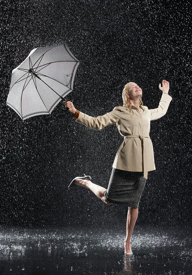 Woman Enjoying The Rain Photograph by Moodboard