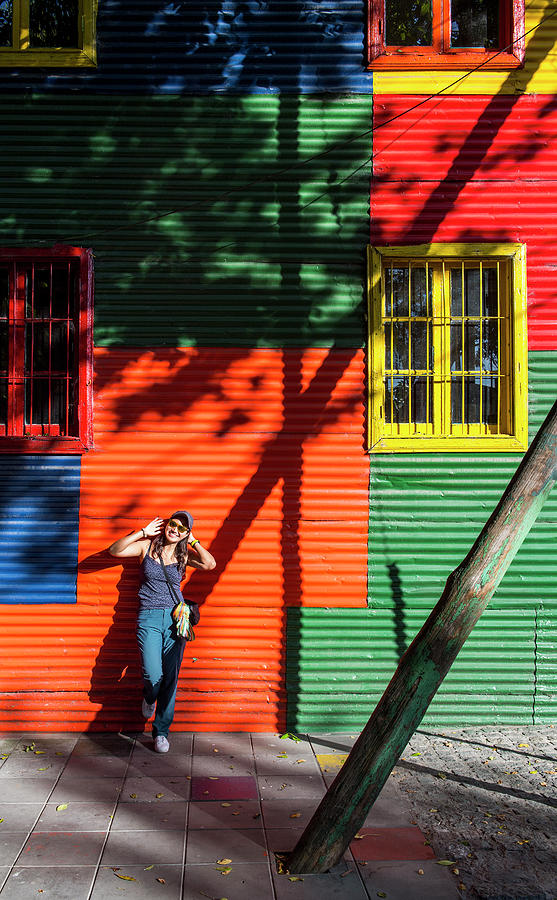 Architecture Photograph - Woman Exploring The La Boca District In Buenos Aires by Cavan Images