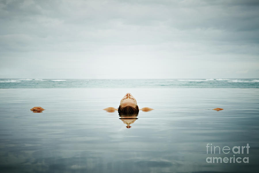 Woman Floating On Back In Infinity Pool Photograph by Thomas Barwick Woman Floating On Back In Infinity Pool Photograph by Thomas Barwick