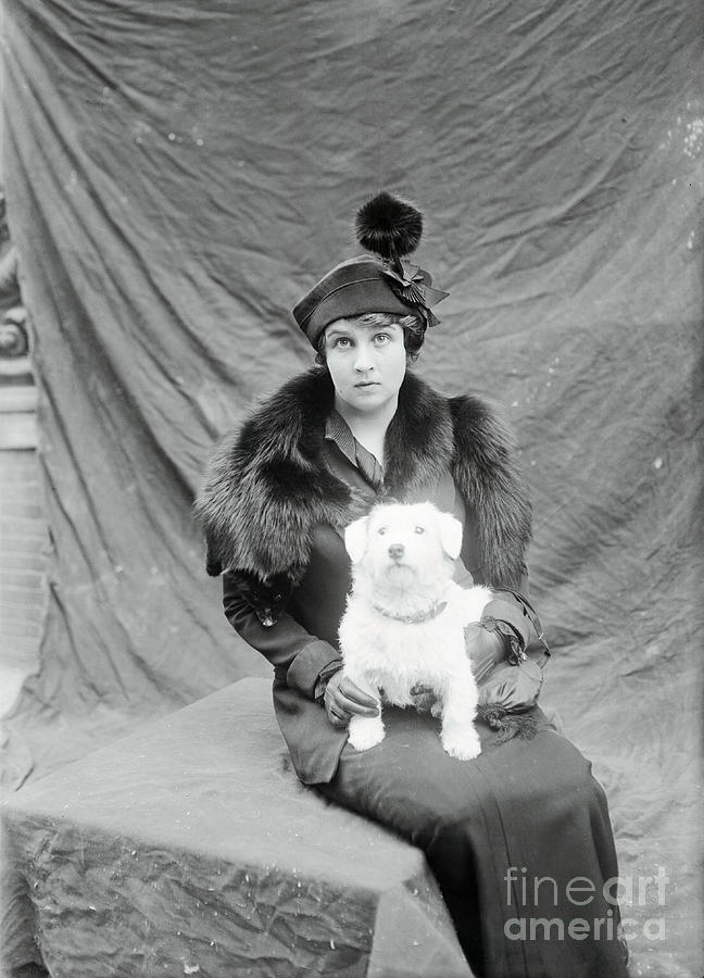 Woman Holding Dog Photograph by Bettmann