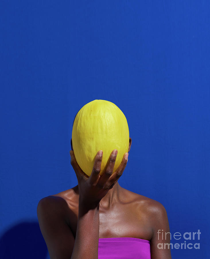 Woman Holding Melon In Front Of Face Photograph by Tara Moore