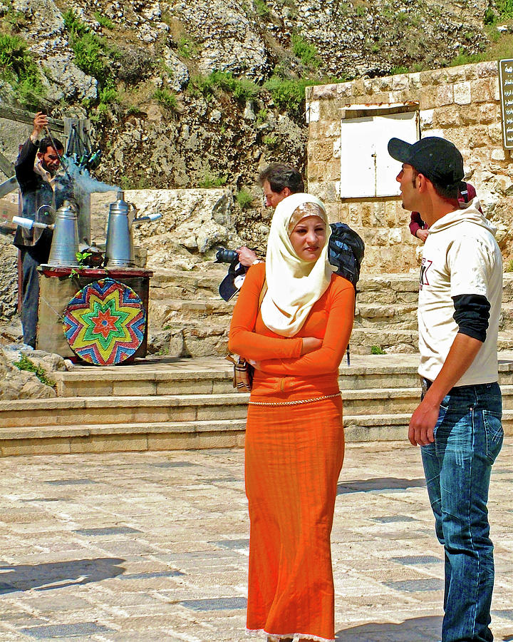 Jordan Photograph - Woman in a Bright Orange Dress by Ajlun Castle, Jordan by Ruth Hager