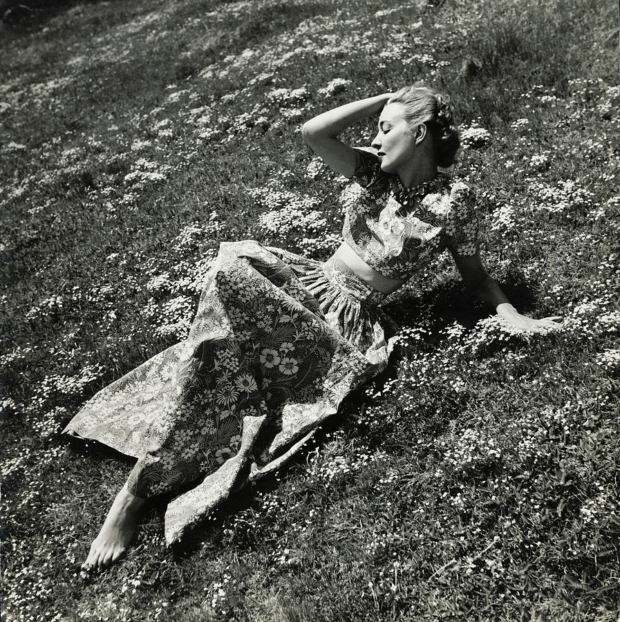 Woman In A Field Of Flowers Photograph by Toni Frissell