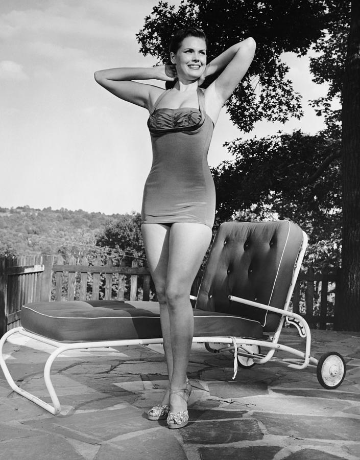 Woman In Bathing Suit Outdoors Photograph by George Marks
