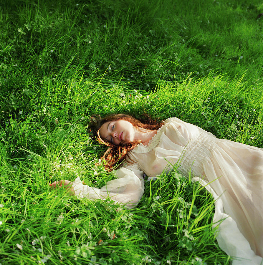 Woman In Dress Lying Down On Grass Photograph By Lisa Kimmell 16 Min