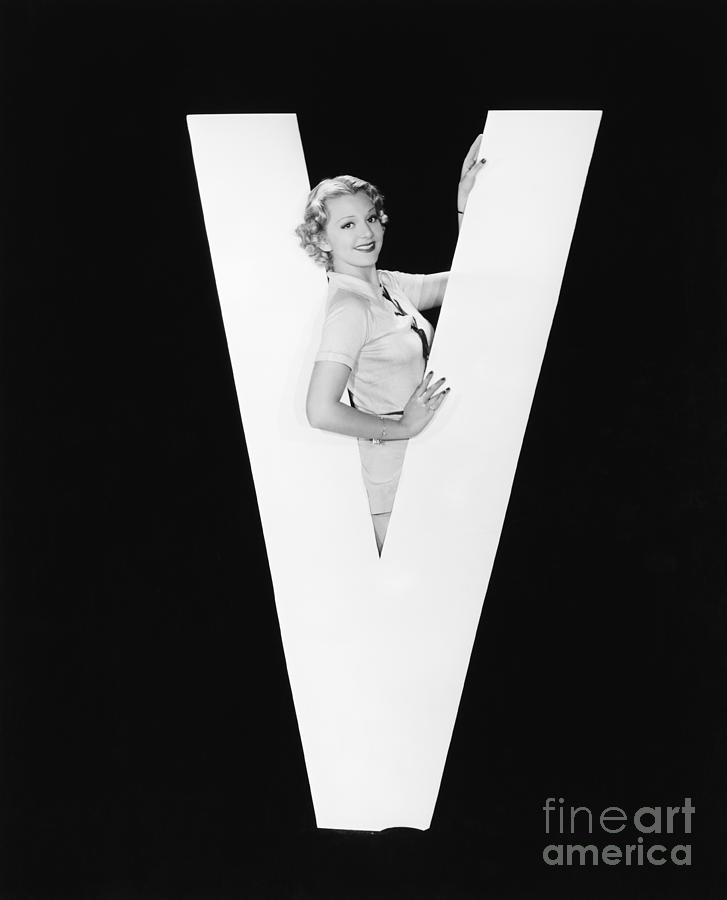 Testimonial Photograph - Woman In Middle Of Huge Letter V by Everett Collection Testimonial Photograph - Woman In Middle Of Huge Letter V by Everett Collection