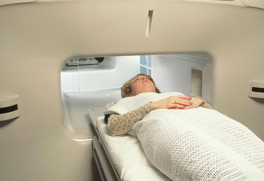 Woman In Wide Mri Scanner For Claustrophobics Photograph by John Greim/science Photo Library