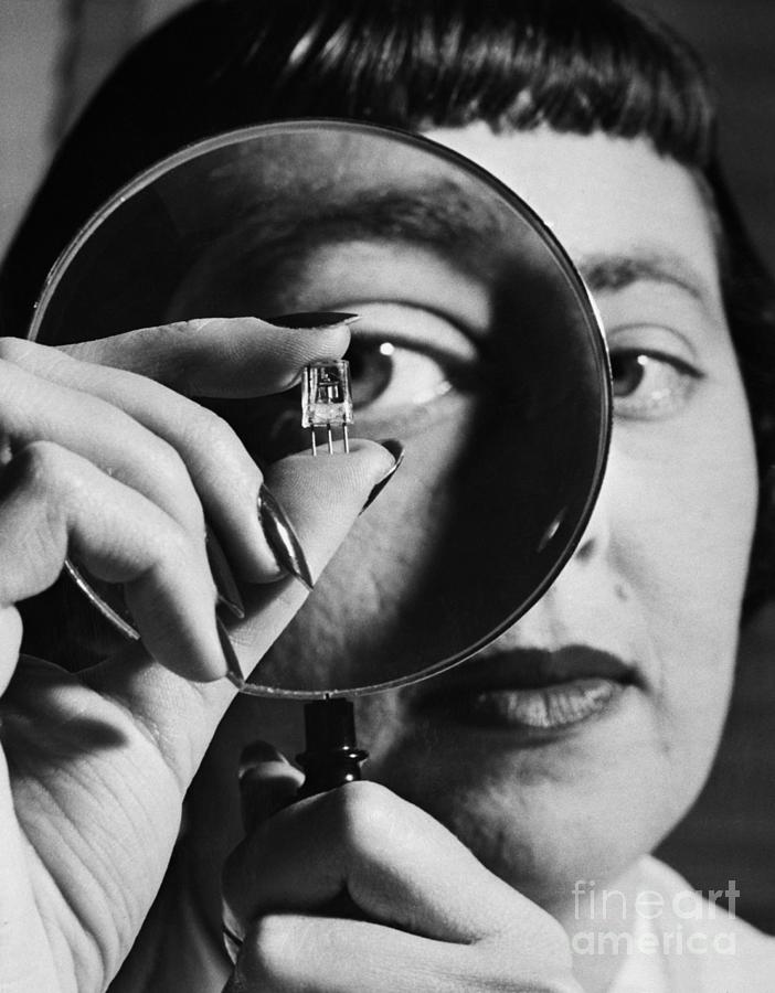 Woman Inspecting Transistor, 1948 Photograph by Bettmann