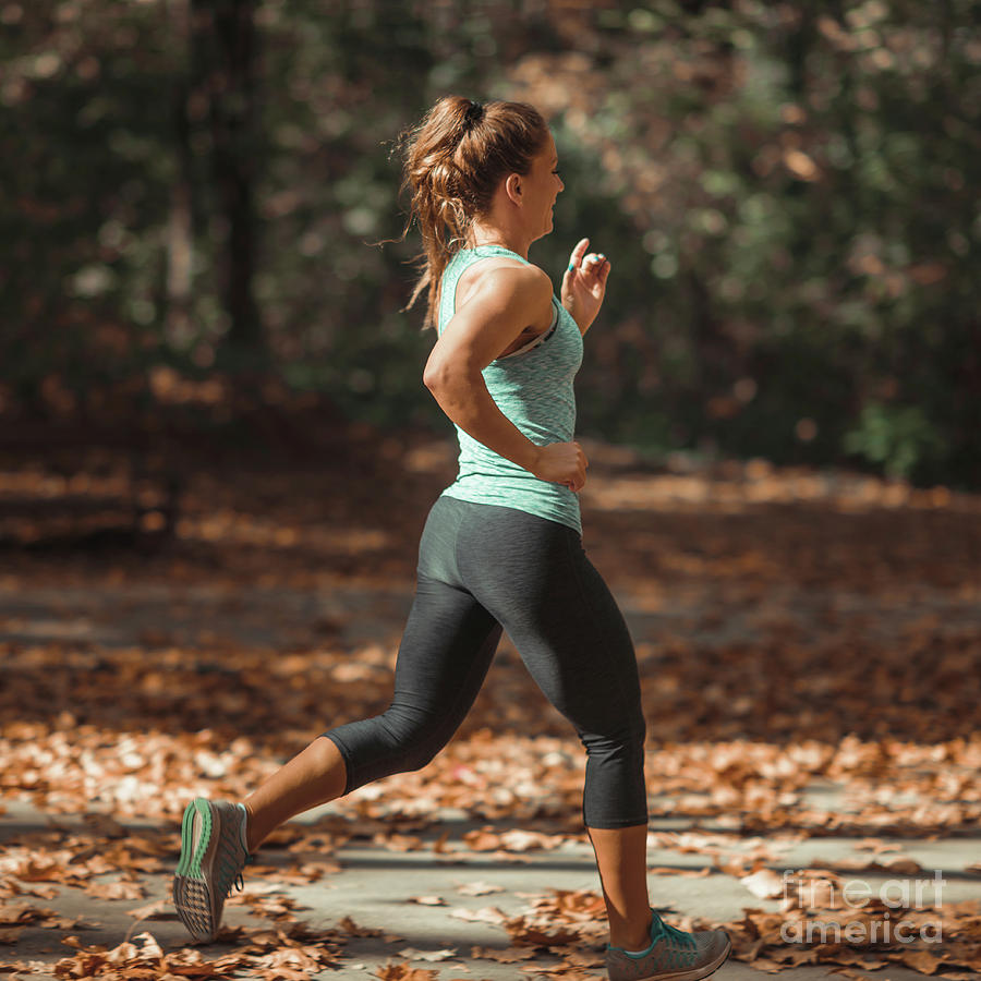 Woman Jogging In Public Park Photograph by Microgen Images/science Photo  Library - Pixels