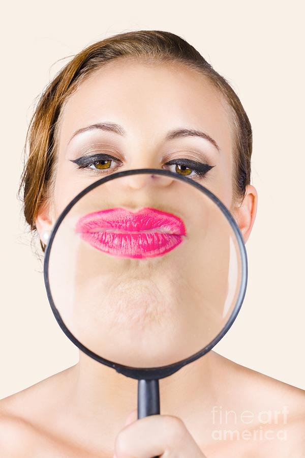 Woman kissing magnifying glass Photograph by Jorgo Photography