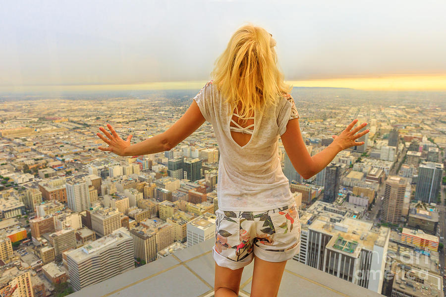 Woman looking Los Angeles Skyline Photograph by Benny Marty