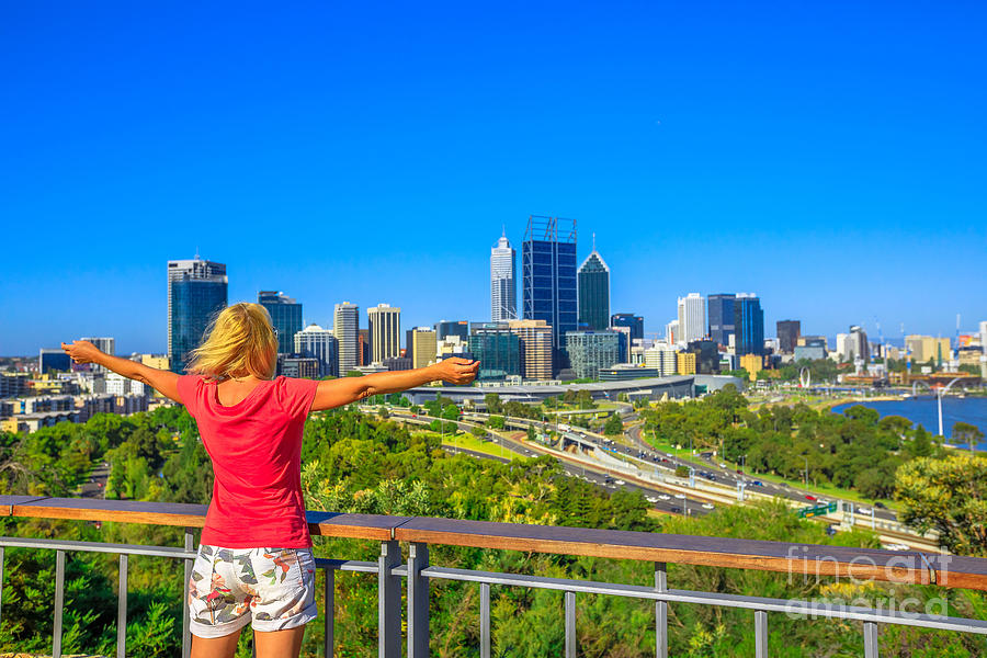 Woman looks Perth Skyline Photograph by Benny Marty