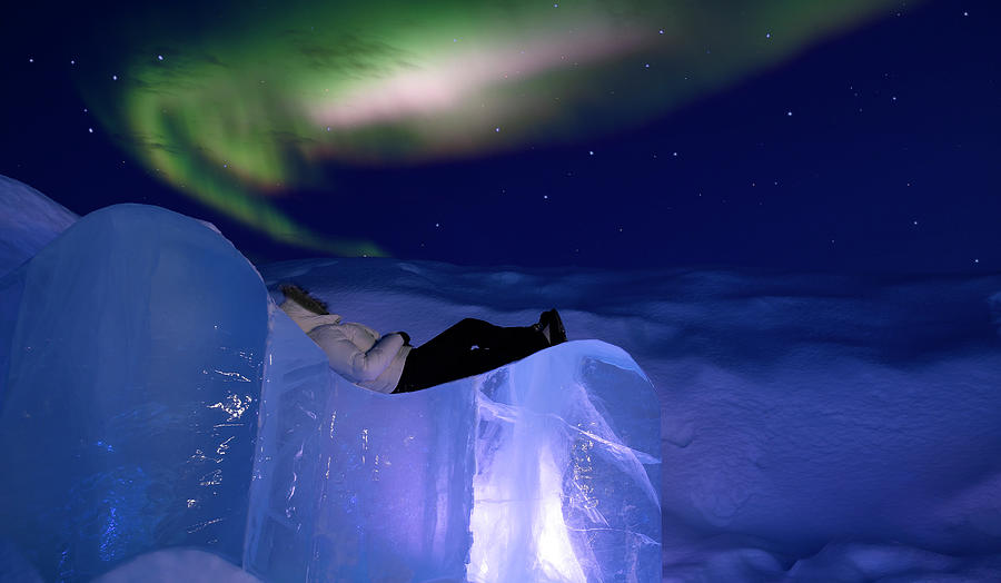 Woman Lying On Ice In Arctic Photograph by Arctic-images