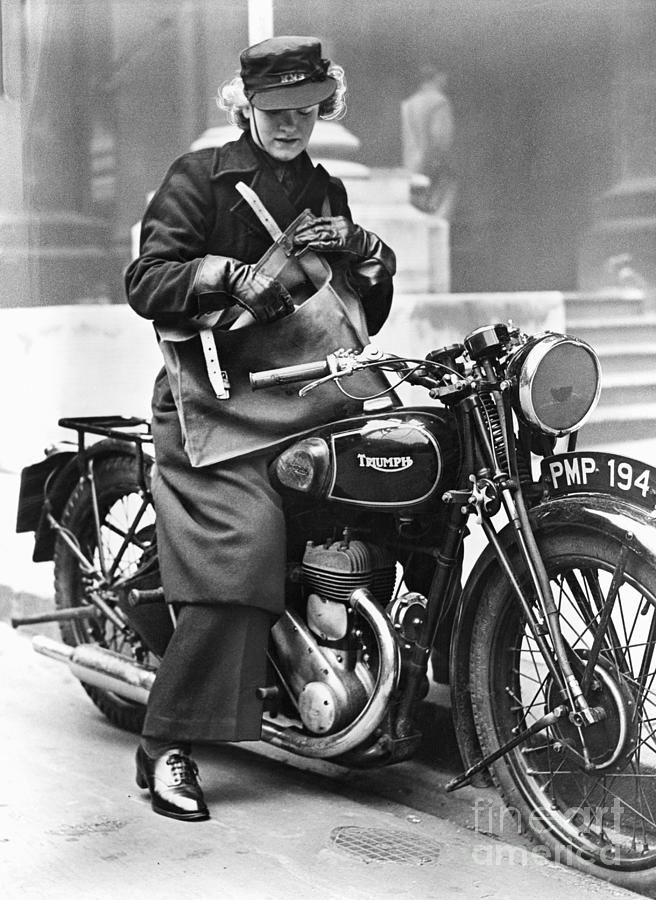 Woman Mail Carrier On Motorcycle Photograph by Bettmann